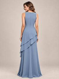 Asymmetrical cascading chiffon layers on dusty blue floor-length mother of the bride dress