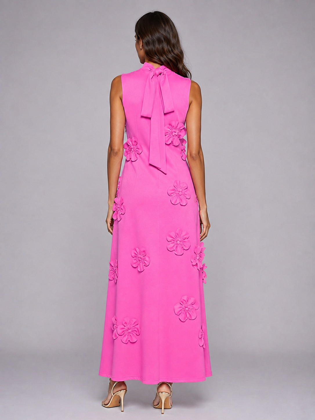 Back view of Jovellee hot pink 3D floral maxi dress