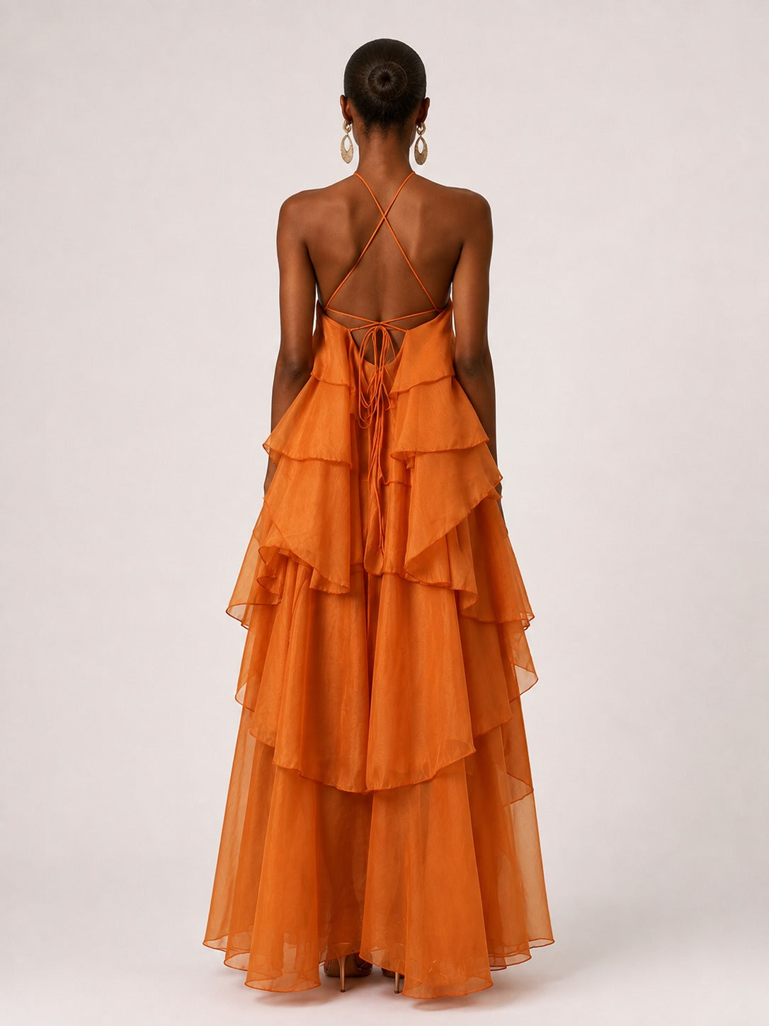 Back view of Jovellee orange chiffon halter maxi dress