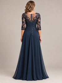 Back view of a navy blue A-line mother of the bride gown with a floor-length skirt and elegant formal silhouette