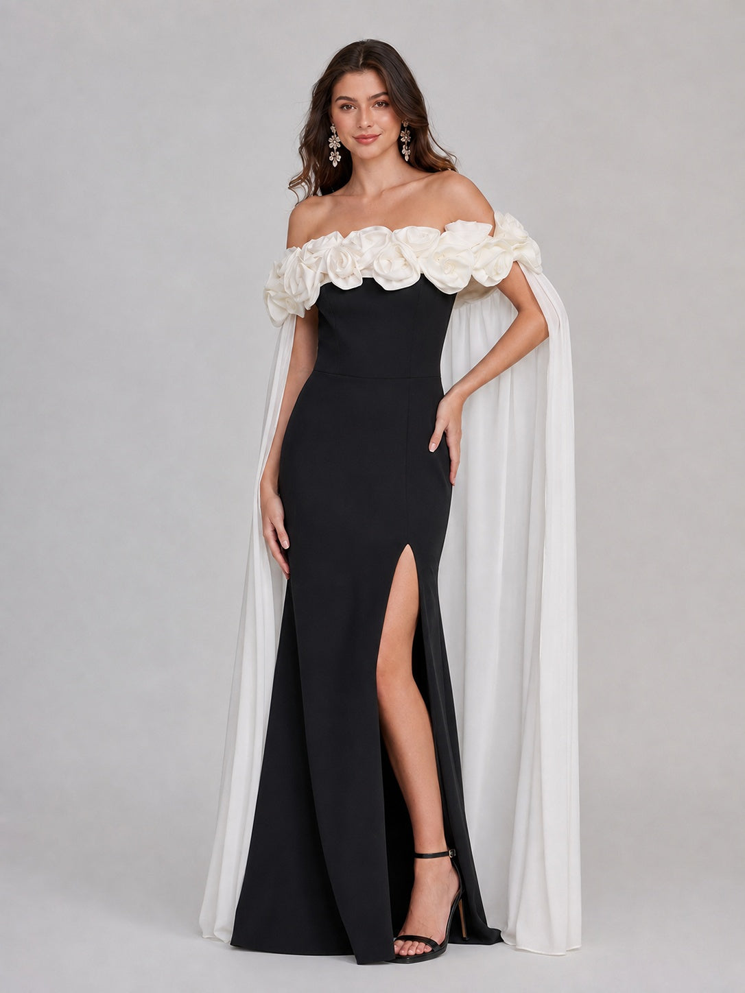 Jovellee black and ivory 3D floral off-shoulder cape prom dress