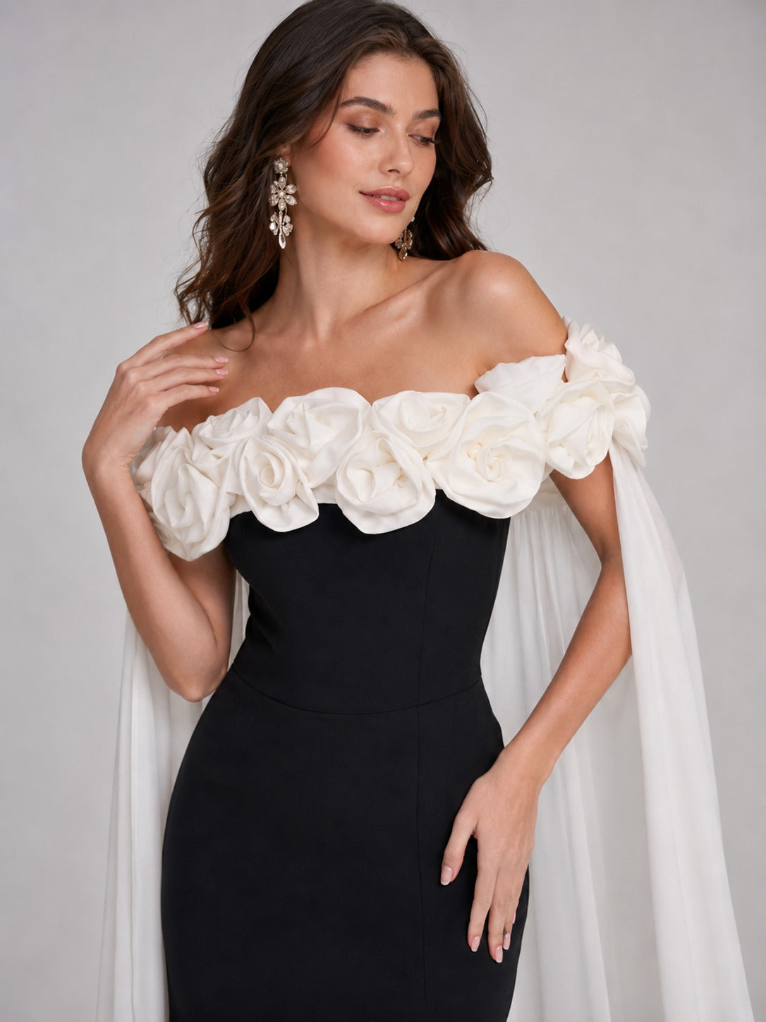 3D floral appliqués on black off-shoulder prom dress