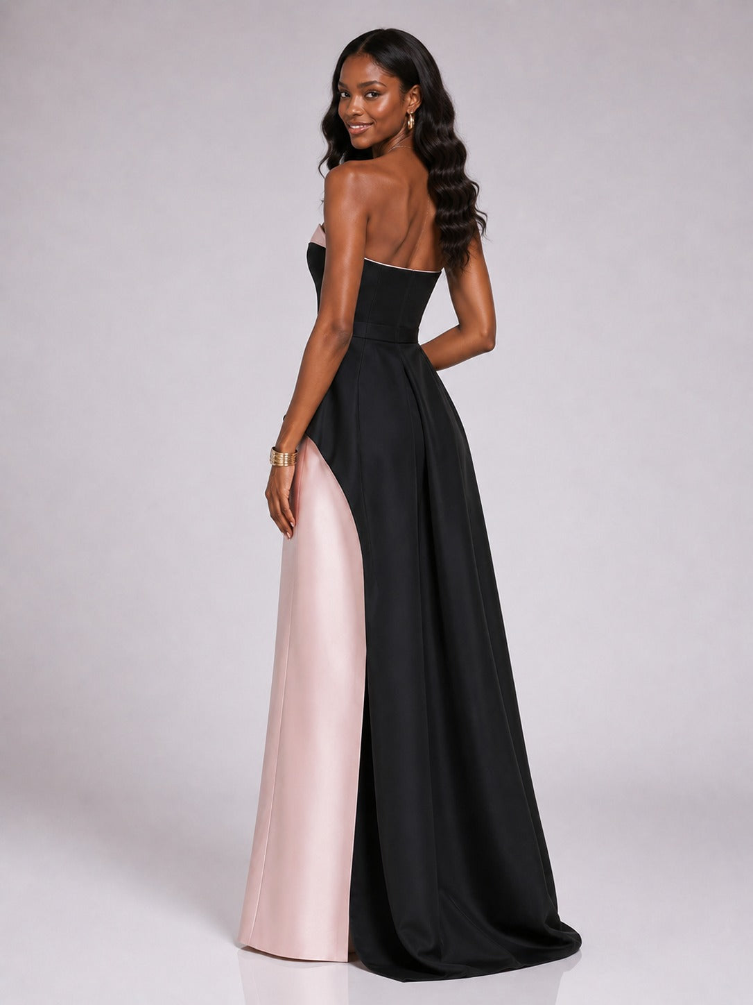 Black and blush floor length strapless satin gown by Jovellee