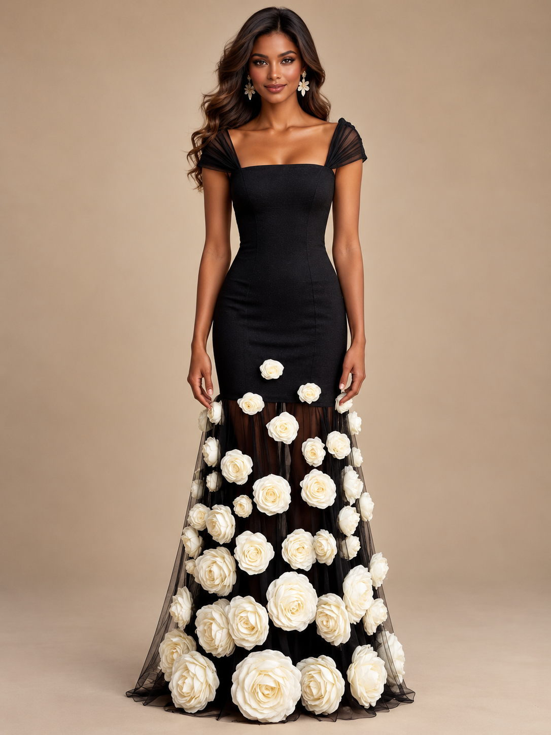 Black and white floral evening gown by Jovellee featuring a fitted bodice and sheer maxi skirt with oversized 3D roses