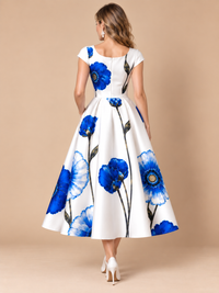 Blue and white floral midi wedding guest dress