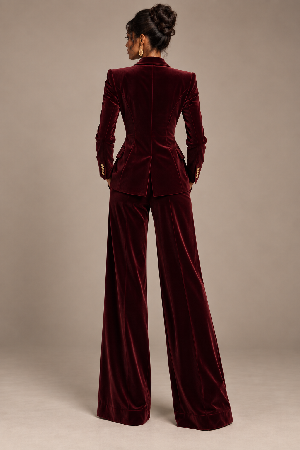 Burgundy velvet blazer with gold buttons and wide leg pants