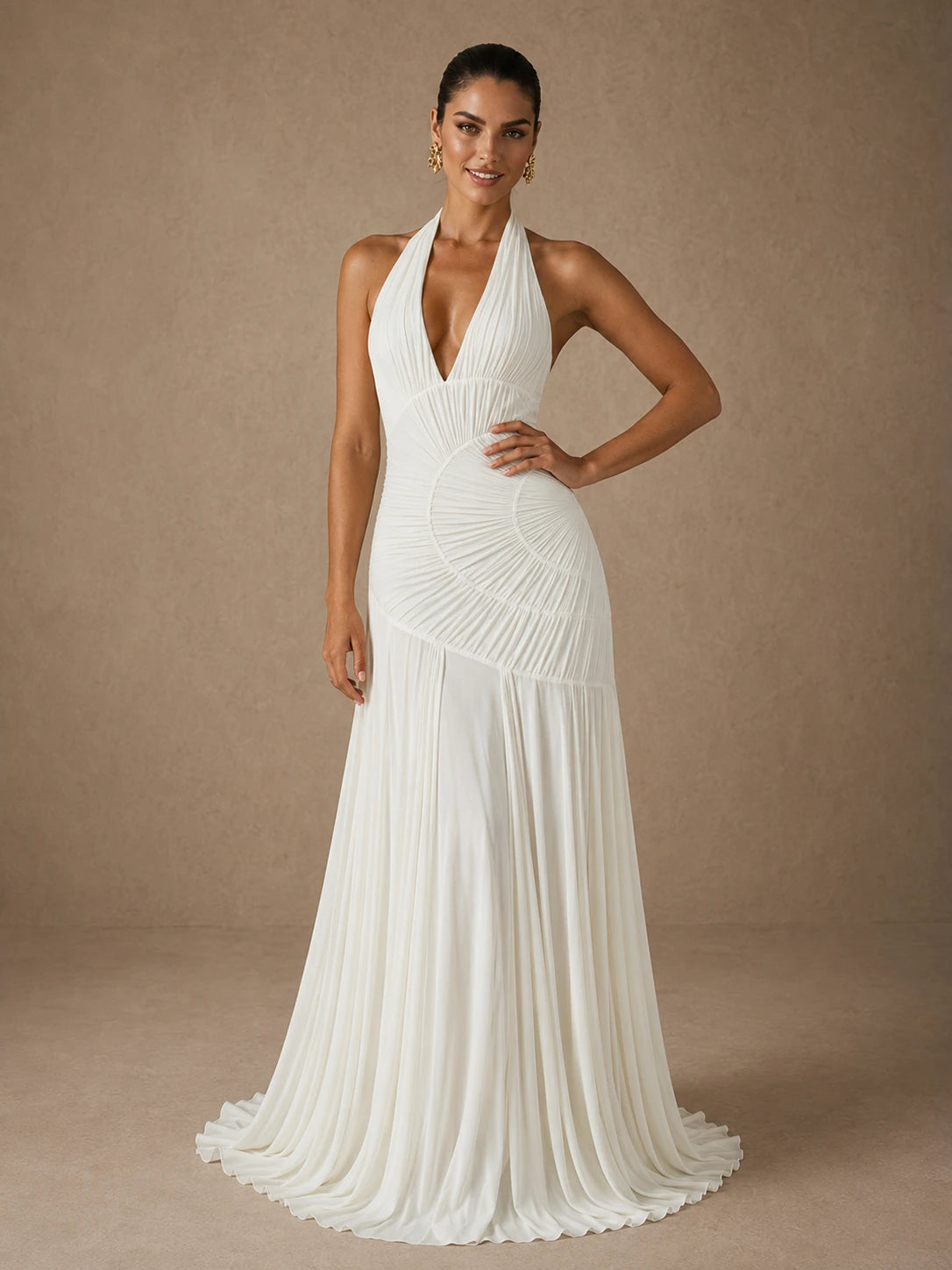 Calista white ruched chiffon wedding dress with a flowing floor-length skirt shown in motion