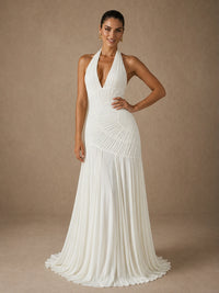 Calista white ruched chiffon wedding dress with a flowing floor-length skirt shown in motion