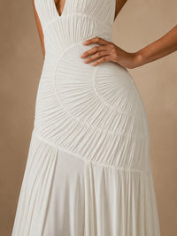 Close-up of the asymmetric ruched waist on the Calista white chiffon wedding dress