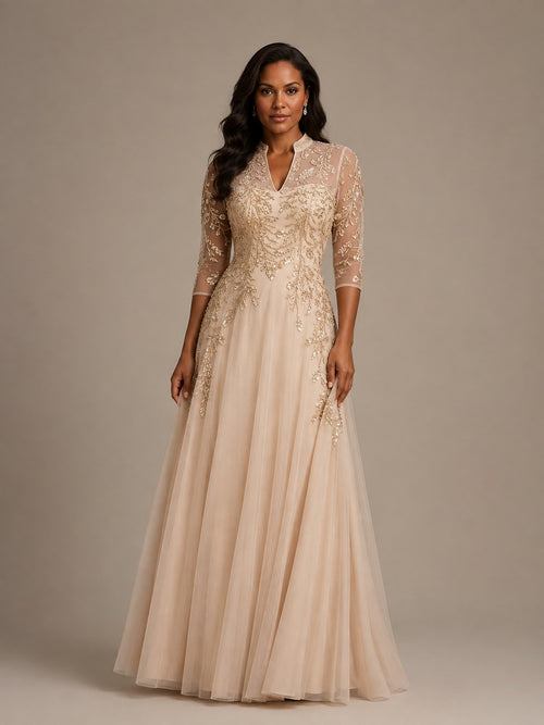 Champagne embellished mother of the bride dress with 3/4 illusion sleeves by Jovellee