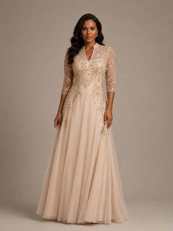Champagne embellished mother of the bride dress with 3/4 illusion sleeves by Jovellee