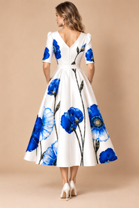 Cobalt blue floral print detail on white midi dress
