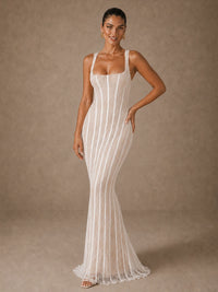 Full-length front view of the Elise white lace mermaid wedding dress with corset-inspired paneling