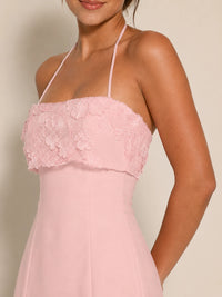 Detailed front view of the pink floral applique neckline on the Jovellee Elodie chiffon dress