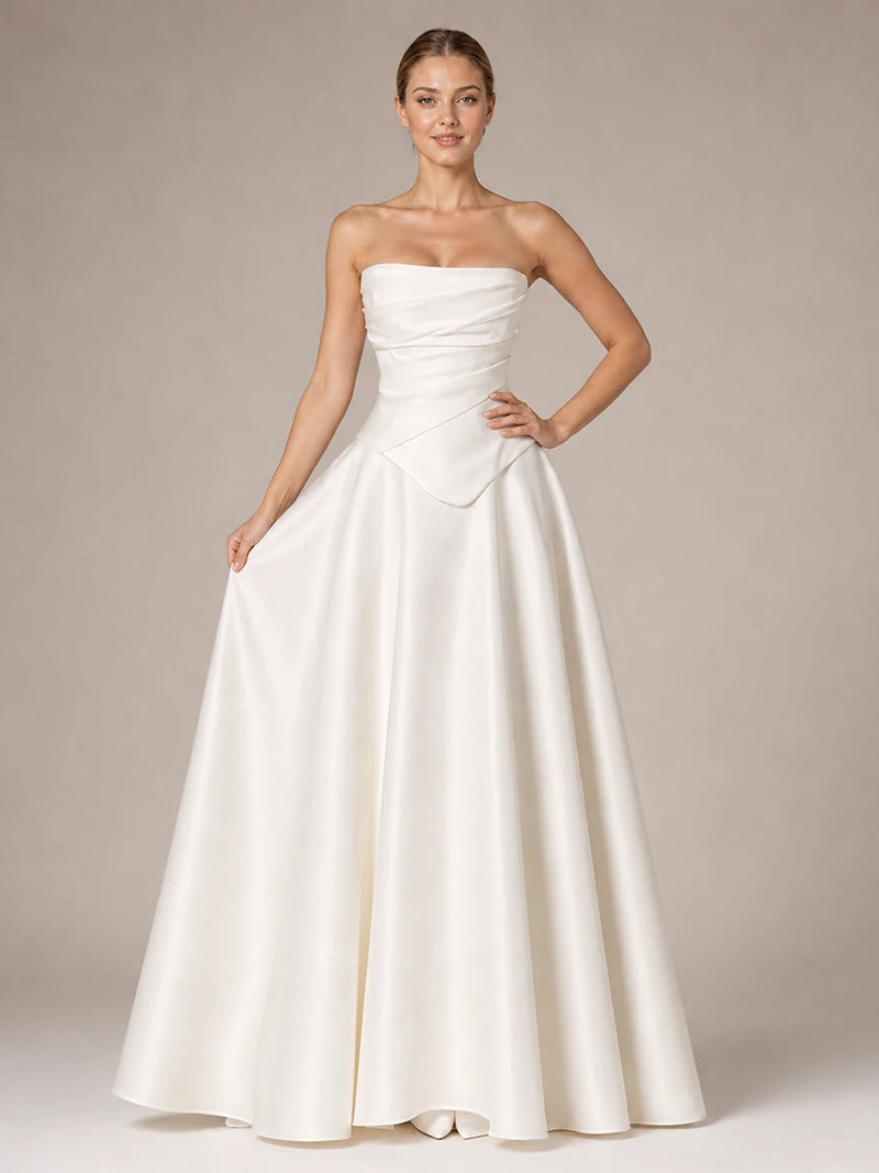 Front view of the Evangeline white satin wedding dress with draped corset bodice and full ball gown skirt