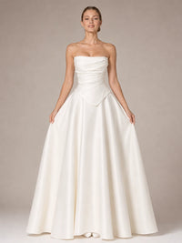 Full-length front view of the Jovellee Evangeline white satin corset wedding dress with ball gown skirt