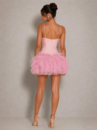 Back view of the Fiora pink corset tulle mini dress with slender straps, fitted bodice and ruffle skirt