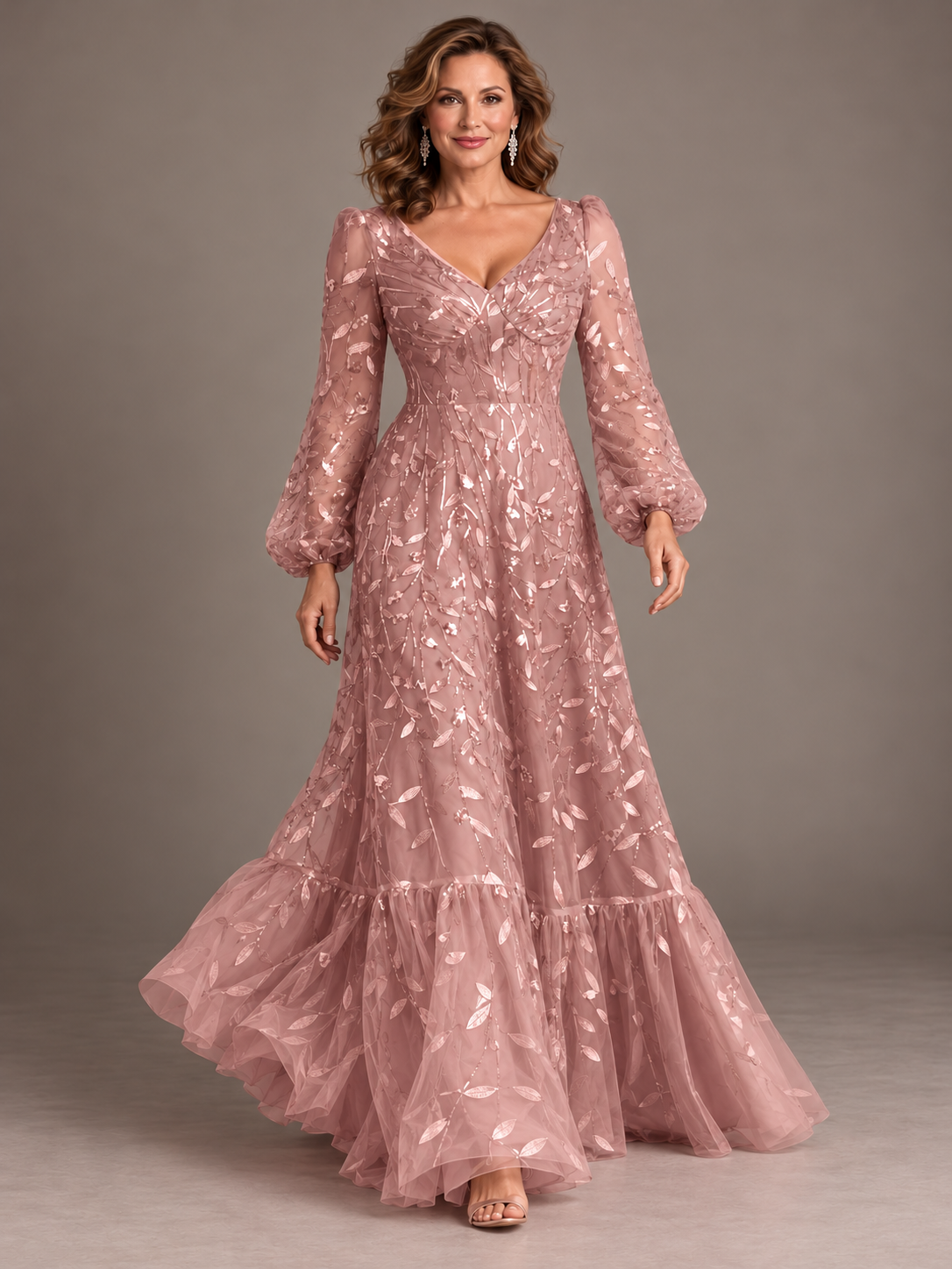Floor length pink A-line evening gown with floral embroidered details