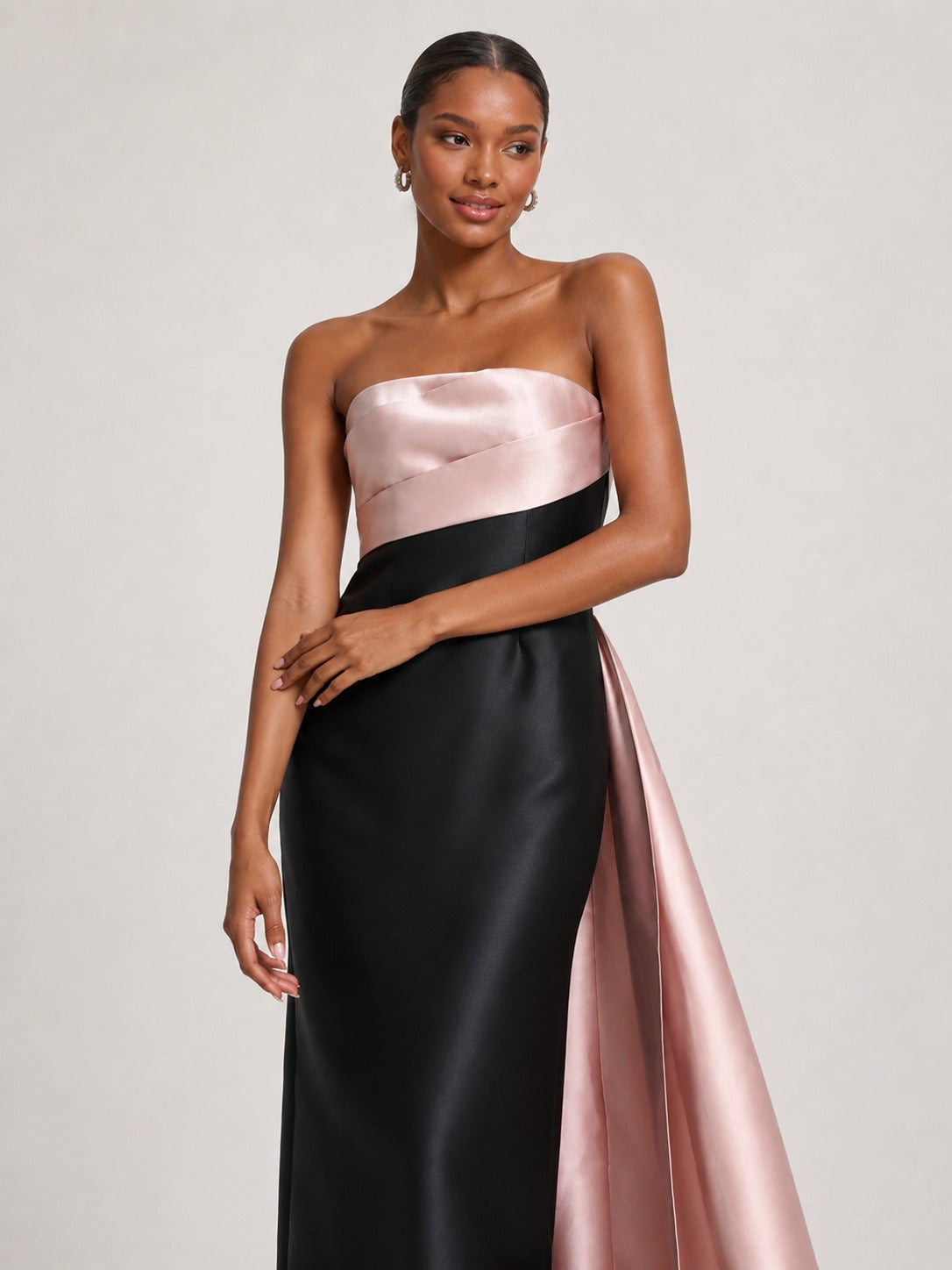 Jovellee black satin evening gown with cascading pink sash