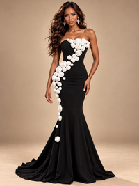 Jovellee black strapless mermaid prom dress with cascading 3D white roses and a floor-length flared skirt, front view