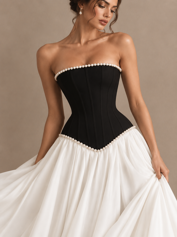Jovellee two-tone black and white prom gown with a fitted strapless bodice and elegant flowing skirt