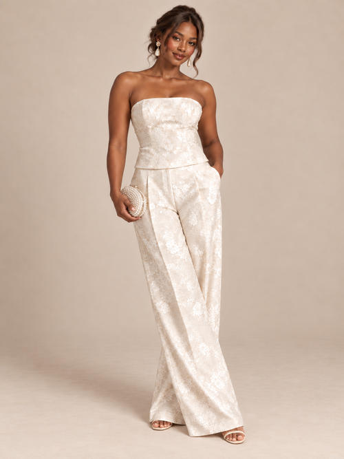 Modern ivory two-piece bridal pants set with strapless top and wide-leg trousers