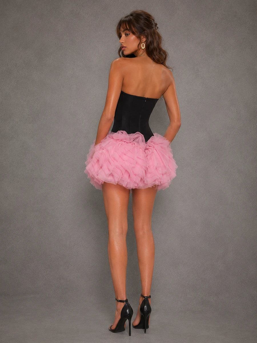 Back view of the Odette black corset pink tulle ruffle mini dress with back zipper closure
