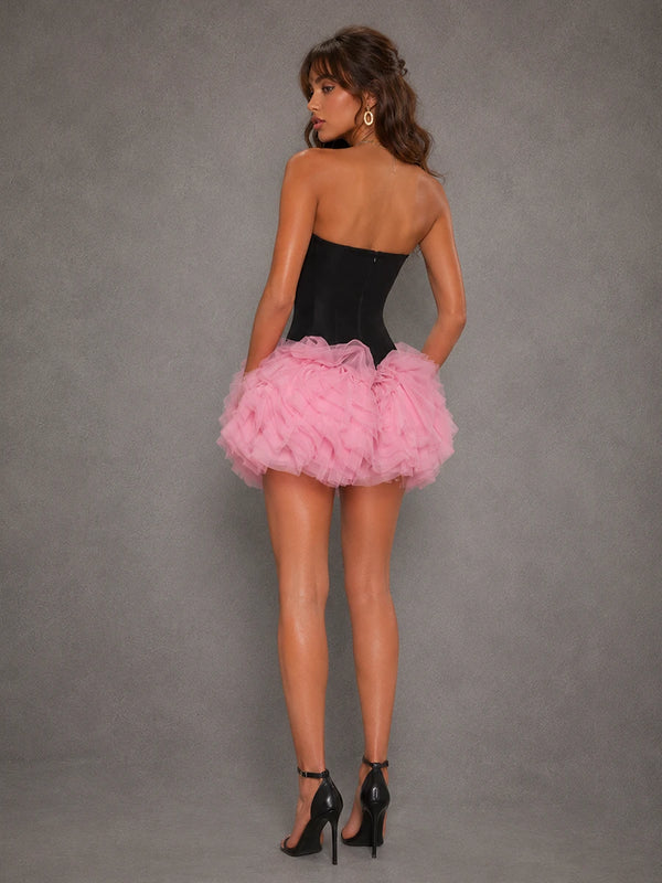 Back view of the Odette black corset pink tulle ruffle mini dress with back zipper closure