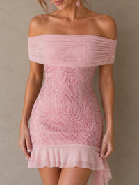 Close front view of the Rosalie pink sequin bodycon mini dress with wave-pattern sequins and asymmetric ruffle hem