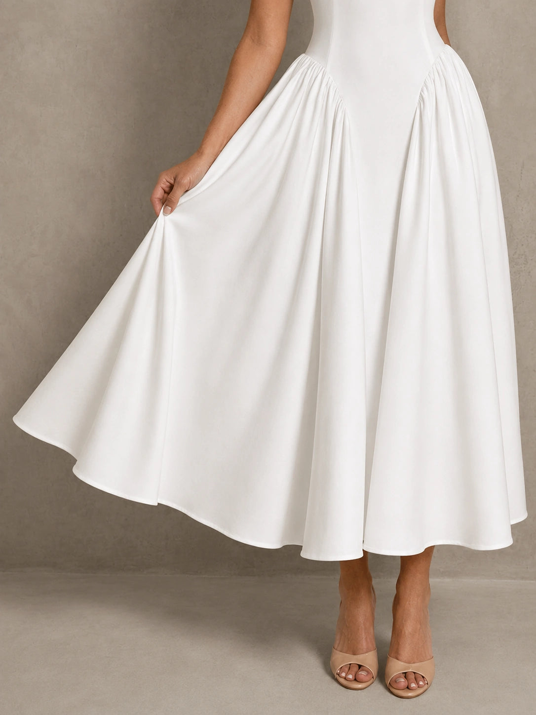Close-up of the Jovellee Rosaline white Basque-waist midi wedding dress with sweetheart neckline and sculpted bodice