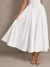 Close-up of the Jovellee Rosaline white Basque-waist midi wedding dress with sweetheart neckline and sculpted bodice