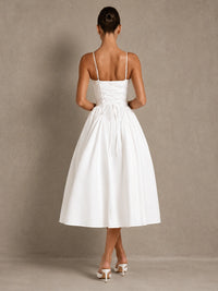 Back view of the Jovellee Rosaline white midi wedding dress showing adjustable straps, lace-up corset back and full skirt