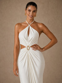 Close-up of the Selene ivory chiffon maxi dress with crossed halter neckline, cowl front and gold ring