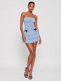 Side view of Jovellee light blue polka dot fit and flare mini dress