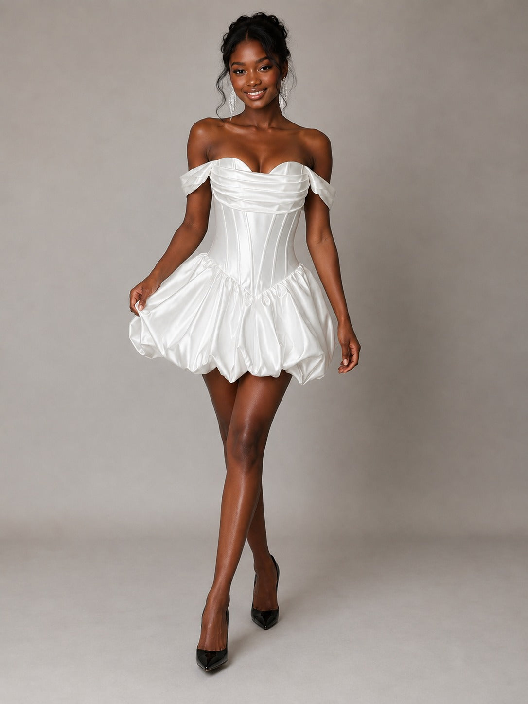 Side view of Jovellee white satin bubble hem mini dress