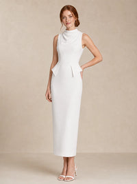 Full-length standing view of the Jovellee Solenne white high-neck wedding dress with a fitted ankle-length column silhouette
