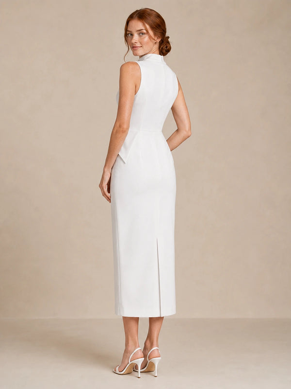 Back three-quarter view of the Jovellee Solenne white high-neck wedding dress with a fitted column silhouette and back slit