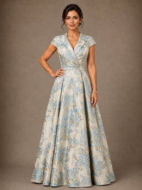Light blue floral jacquard V-neck mother of the bride gown with cap sleeves and A-line skirt