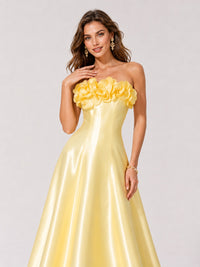 Yellow strapless satin maxi dress with floral appliqué neckline