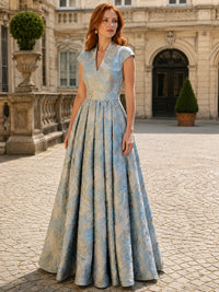 Blue floral jacquard mother of the bride dress with V-neck and cap sleeves