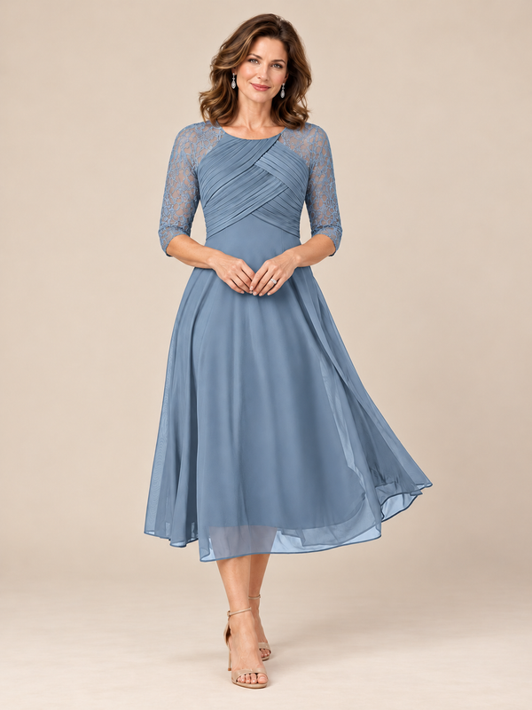 Jovellee dusty blue tea-length mother of the bride dress with pleated bodice and sheer lace 3/4 sleeves, front view