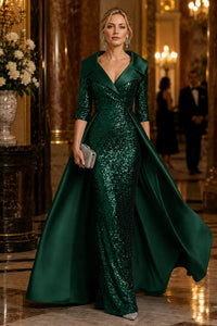 Emerald green sequin mother of the bride formal evening gown with satin overskirt, V-neckline, and 3/4 sleeves.